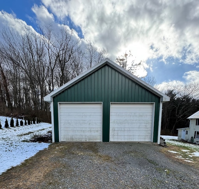 view of snow covered garage