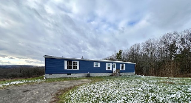 manufactured / mobile home featuring central AC unit