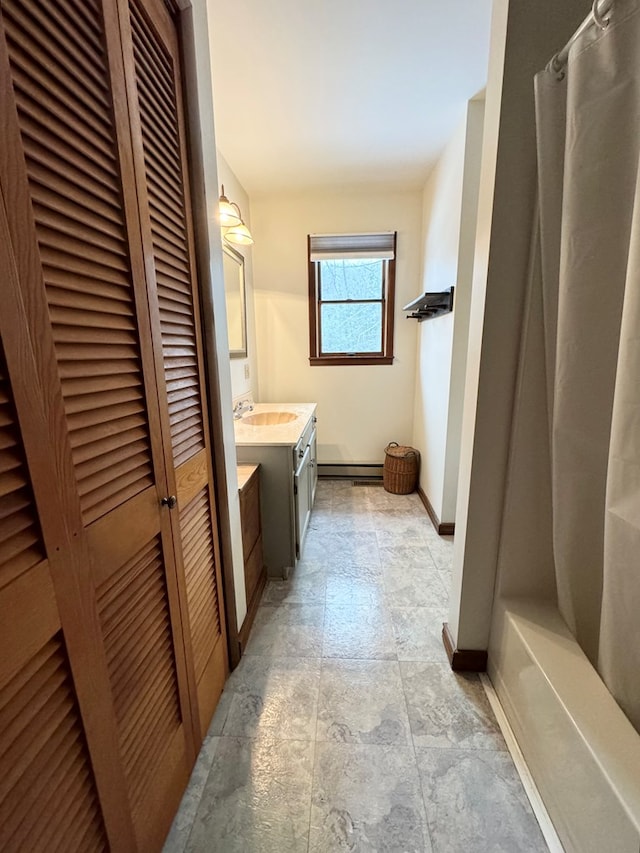 bathroom with a shower with shower curtain and vanity