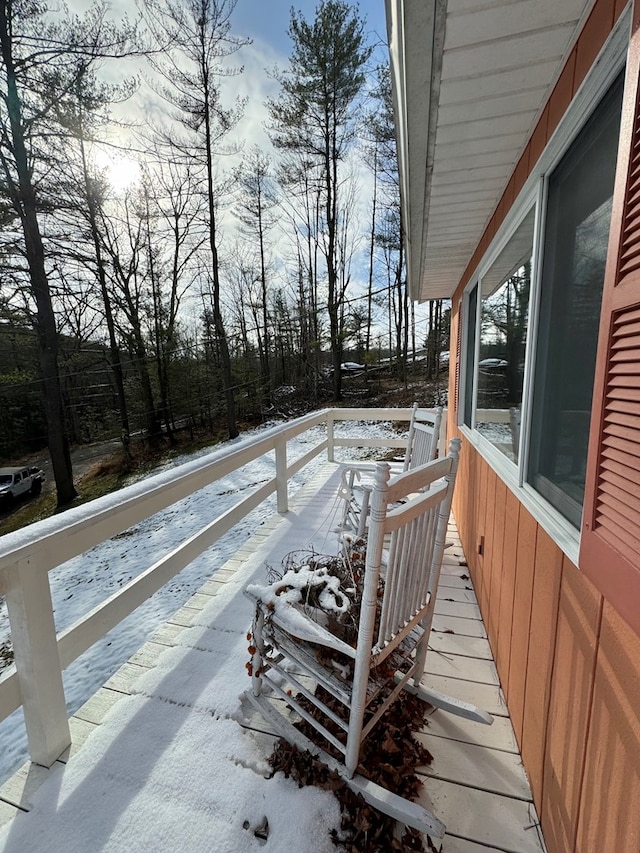 view of snow covered deck