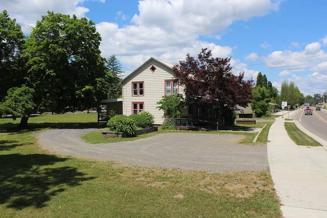 exterior space with a yard