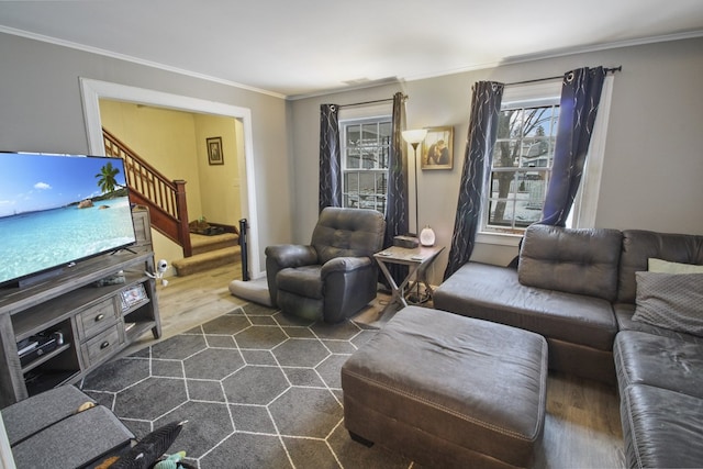 living room featuring stairway, dark wood-style flooring, and crown molding