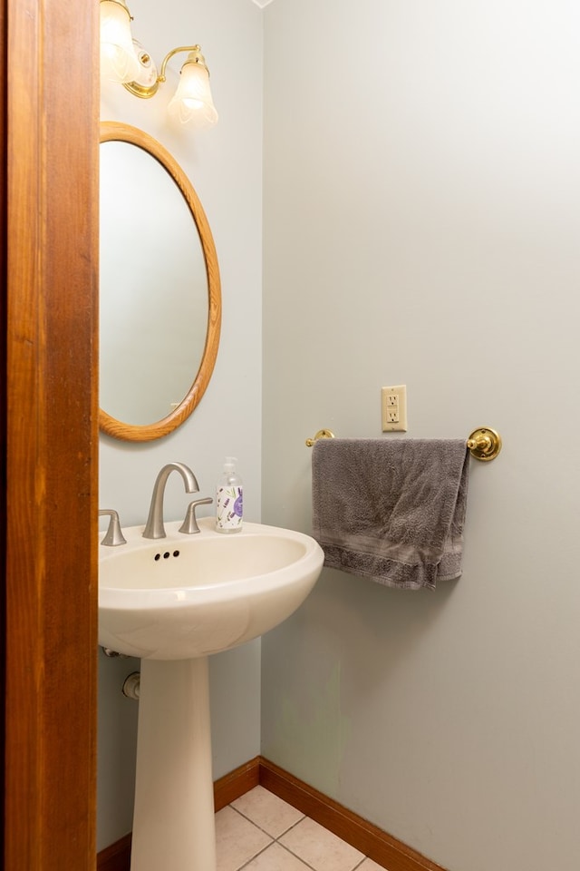 bathroom featuring tile patterned floors and sink