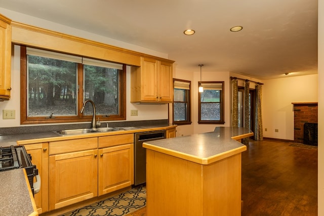 kitchen with a wealth of natural light, dishwasher, a center island, dark wood-type flooring, and sink