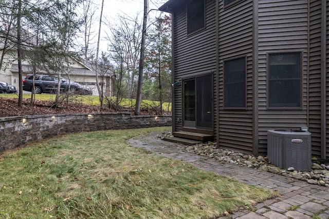 view of yard featuring central AC unit