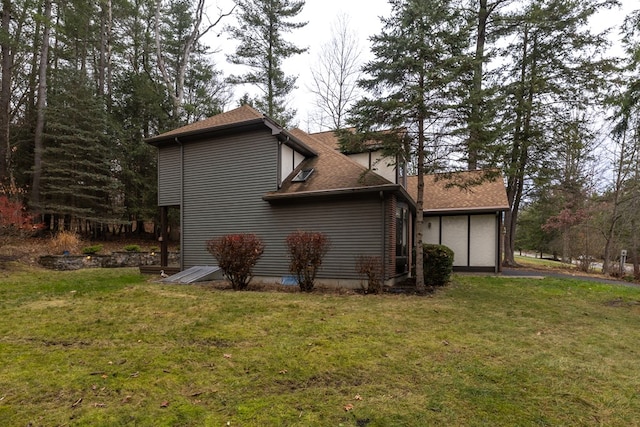 view of home's exterior featuring a lawn