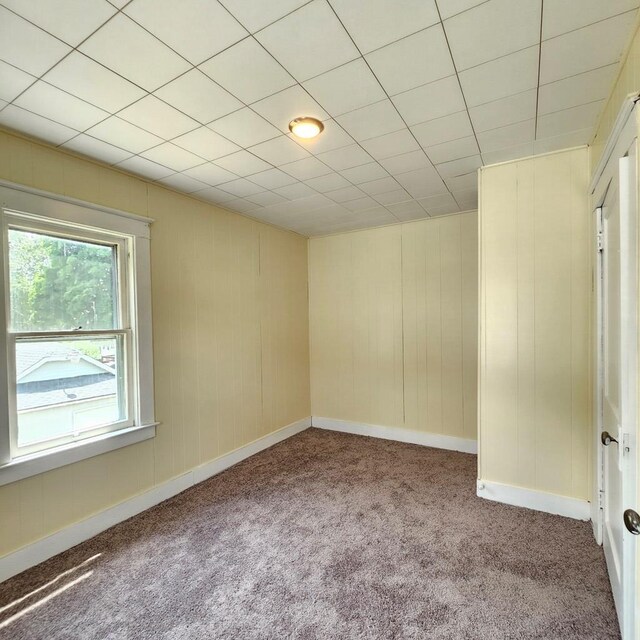 unfurnished room featuring carpet flooring