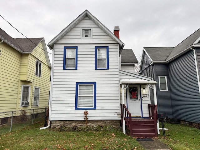 view of front of home with a front lawn