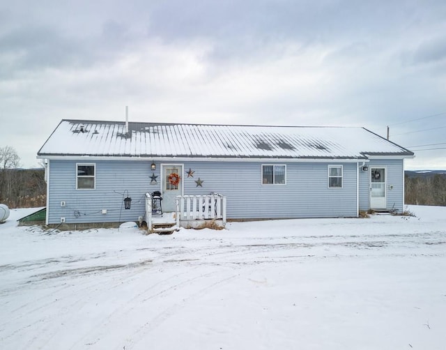 view of snow covered property