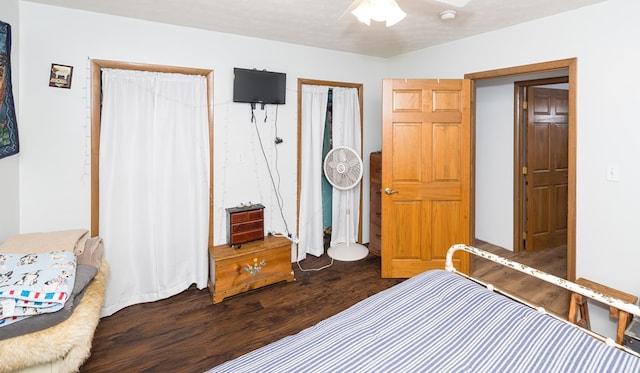 bedroom featuring ceiling fan and wood-type flooring