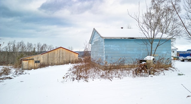 view of snow covered property