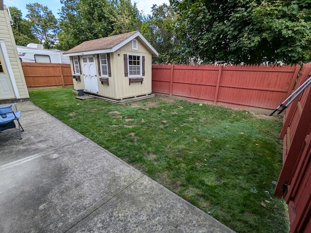 view of outbuilding featuring a yard