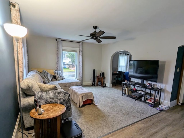 bedroom with wood-type flooring and ceiling fan