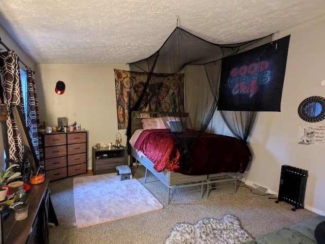 carpeted bedroom with a textured ceiling