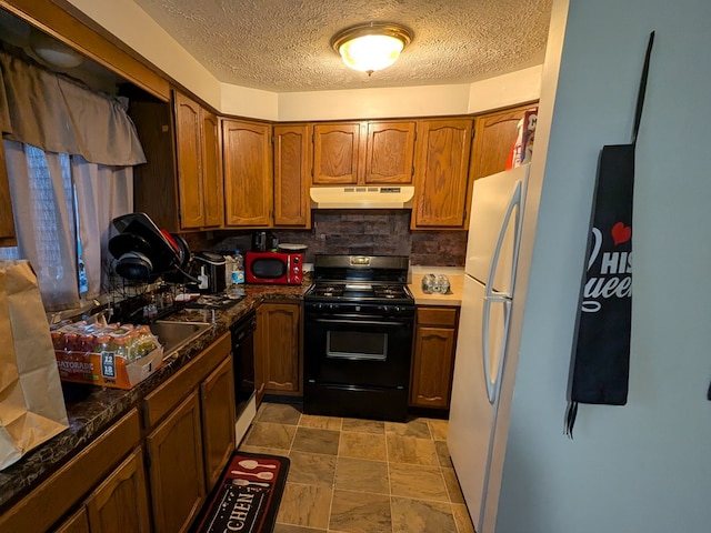 kitchen with backsplash, black appliances, and a textured ceiling