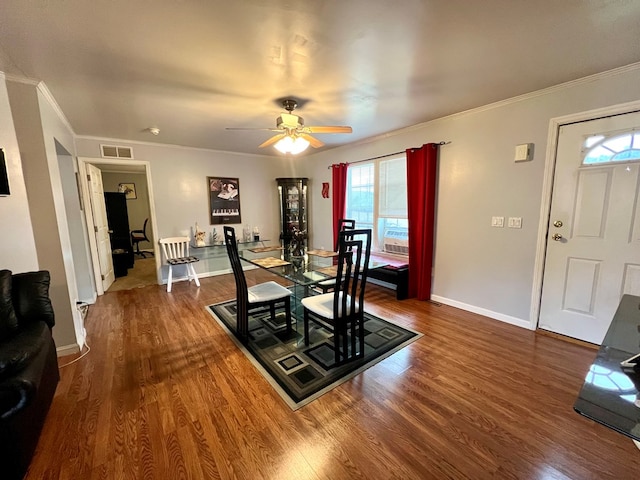 dining area with hardwood / wood-style flooring, ceiling fan, and ornamental molding