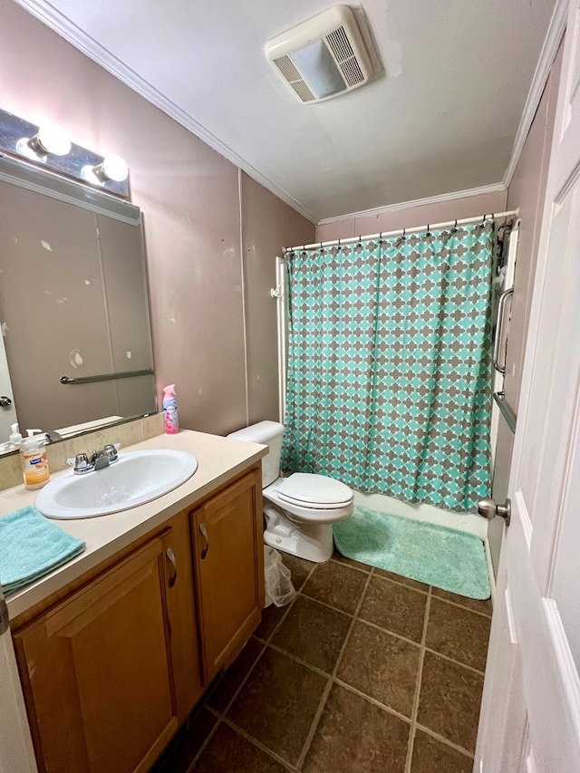 bathroom with tile patterned flooring, vanity, toilet, and crown molding