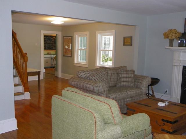 living room featuring dark hardwood / wood-style floors