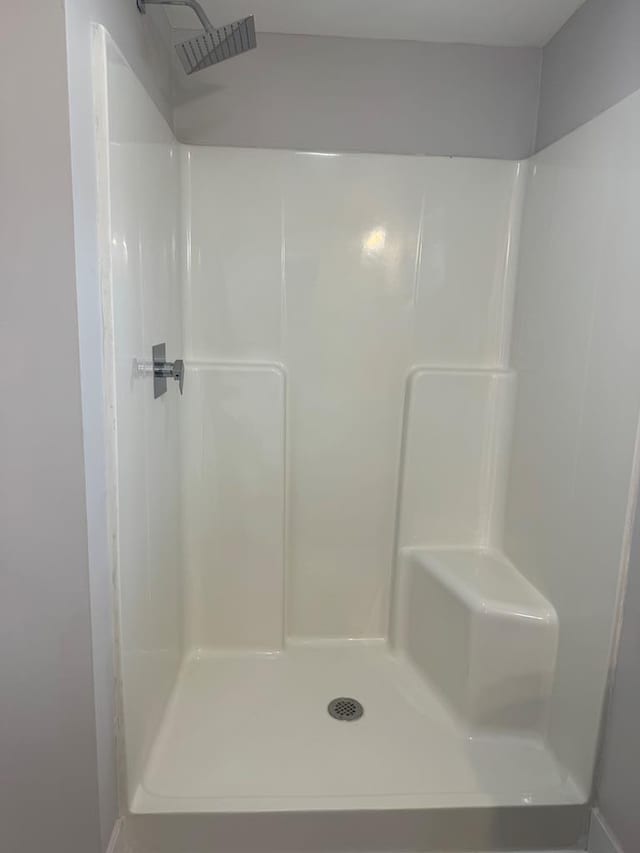 bathroom featuring a shower