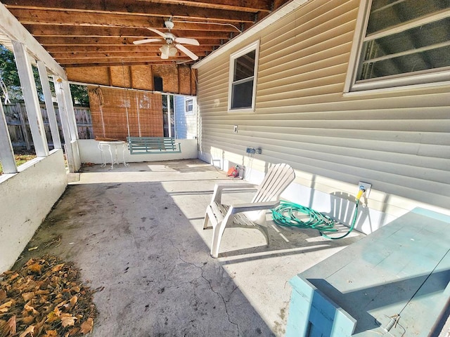 view of patio / terrace featuring ceiling fan