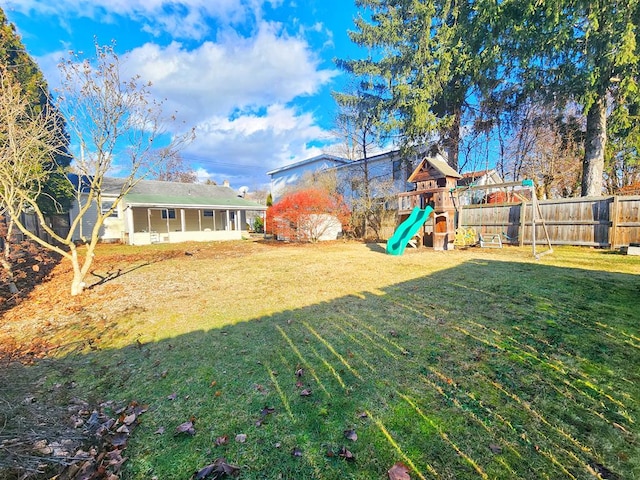 view of yard with a playground