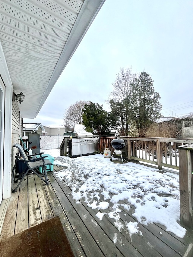 view of snow covered deck