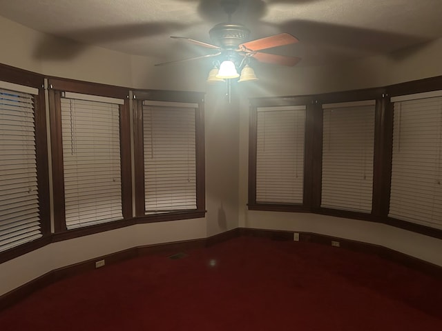 spare room with ceiling fan