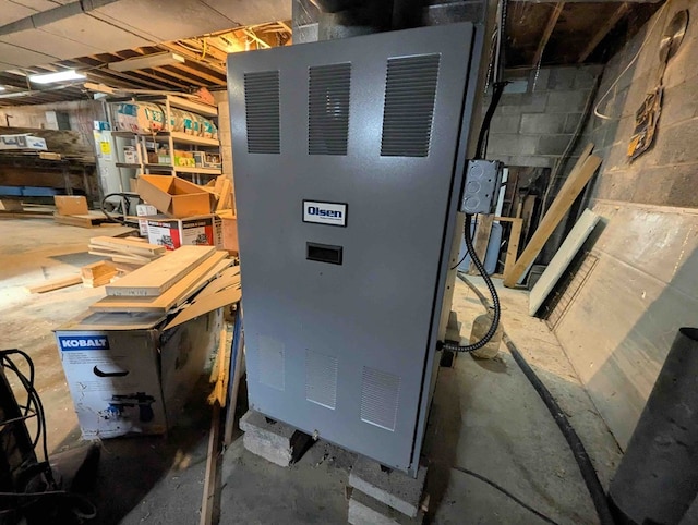 utility room with heating unit