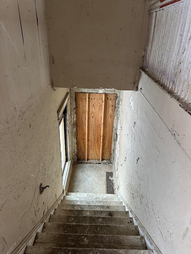 staircase with visible vents