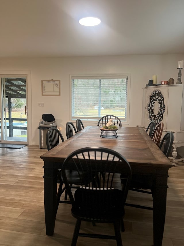 dining room with light hardwood / wood-style floors