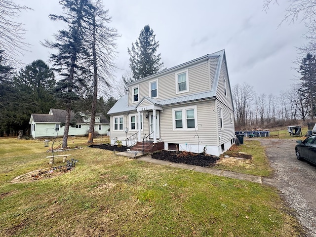 front facade with a front yard