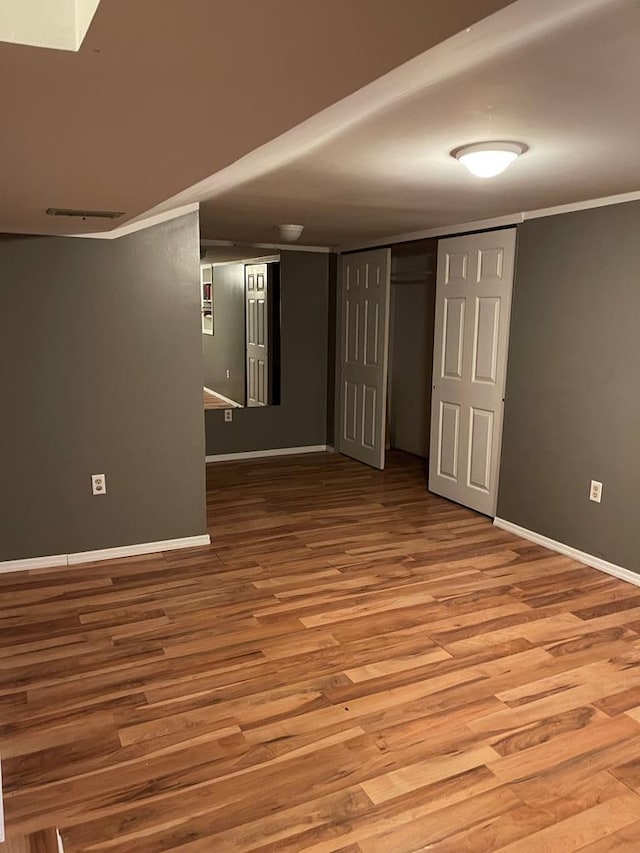 unfurnished room featuring light hardwood / wood-style floors