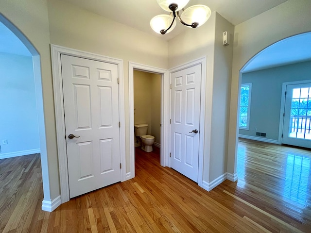 hallway featuring hardwood / wood-style floors