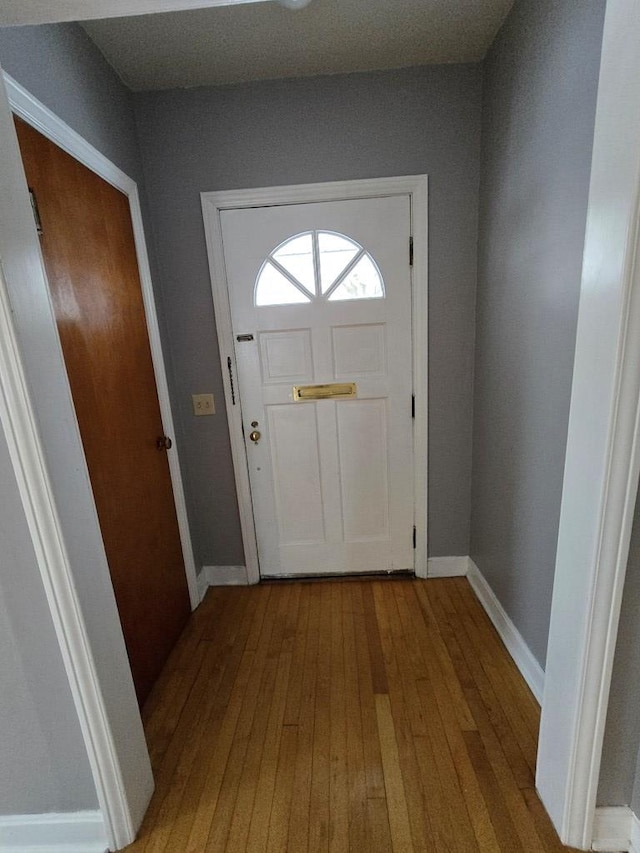 doorway to outside featuring light hardwood / wood-style flooring