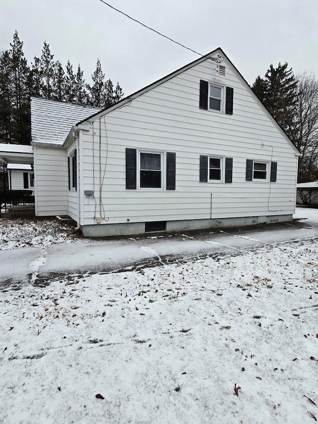 view of snow covered property