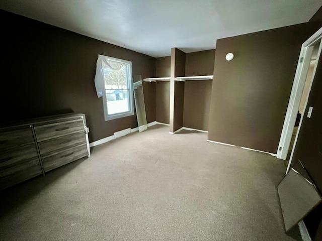 unfurnished bedroom with carpet floors