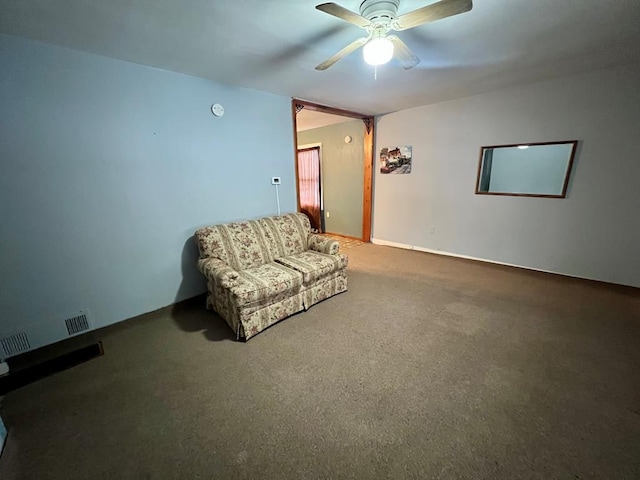 unfurnished room with carpet flooring and ceiling fan