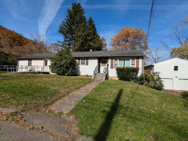 single story home featuring a front yard