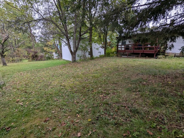 view of yard with a deck