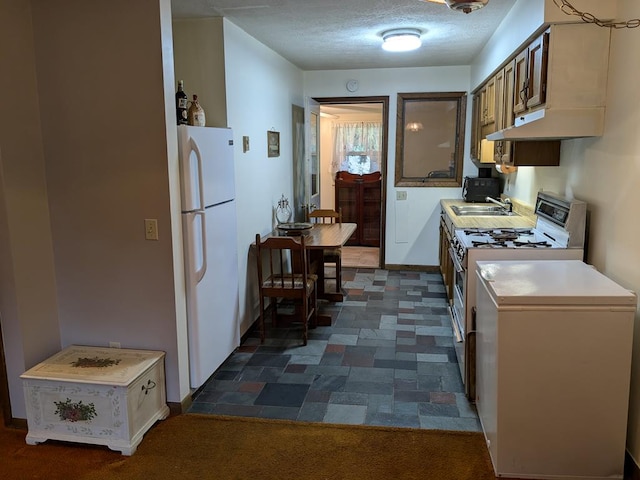 kitchen with electric range, sink, a textured ceiling, and white refrigerator