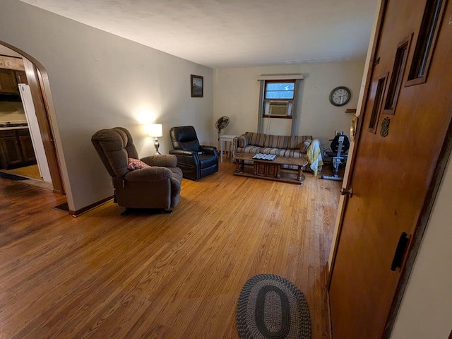 living room with light hardwood / wood-style flooring and cooling unit