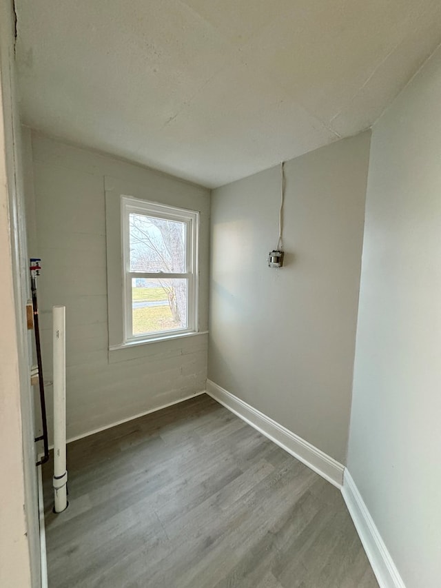 empty room featuring hardwood / wood-style flooring