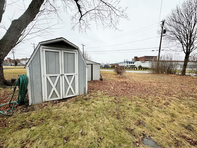 view of outbuilding with a yard