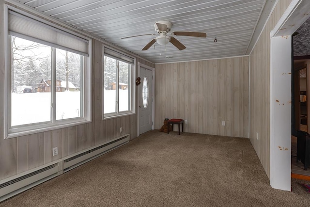 interior space with a baseboard radiator and ceiling fan