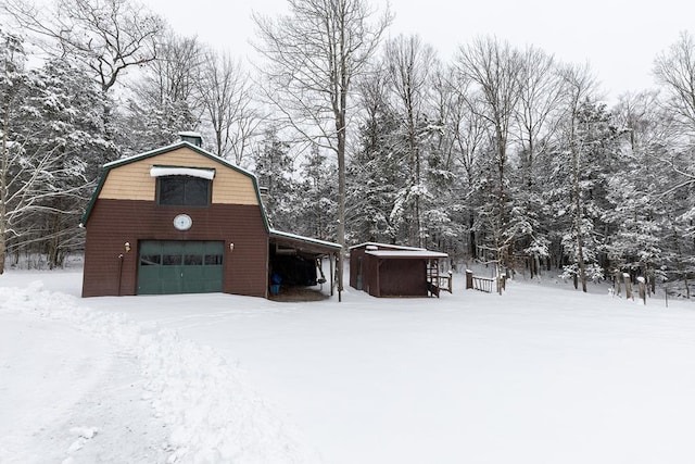 view of snow covered garage