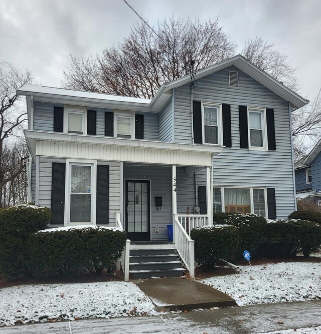 view of front property featuring a porch