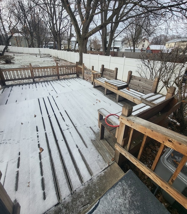 view of snow covered deck