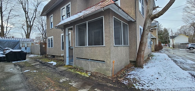 view of snow covered property