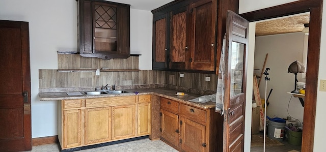 kitchen featuring sink and decorative backsplash