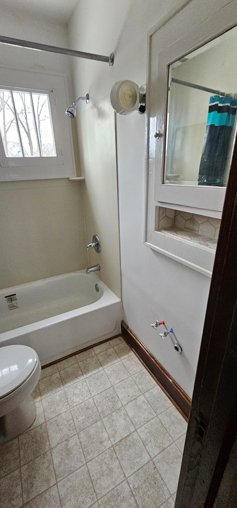 bathroom with  shower combination and toilet